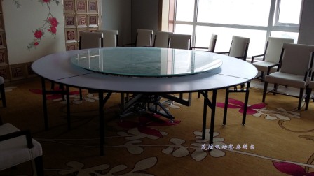山东烟台酒店大型实木电动餐桌图片
